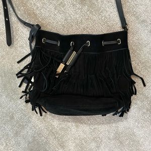 Vince Camuto black fringe bucket bag with drawstring and button clasp